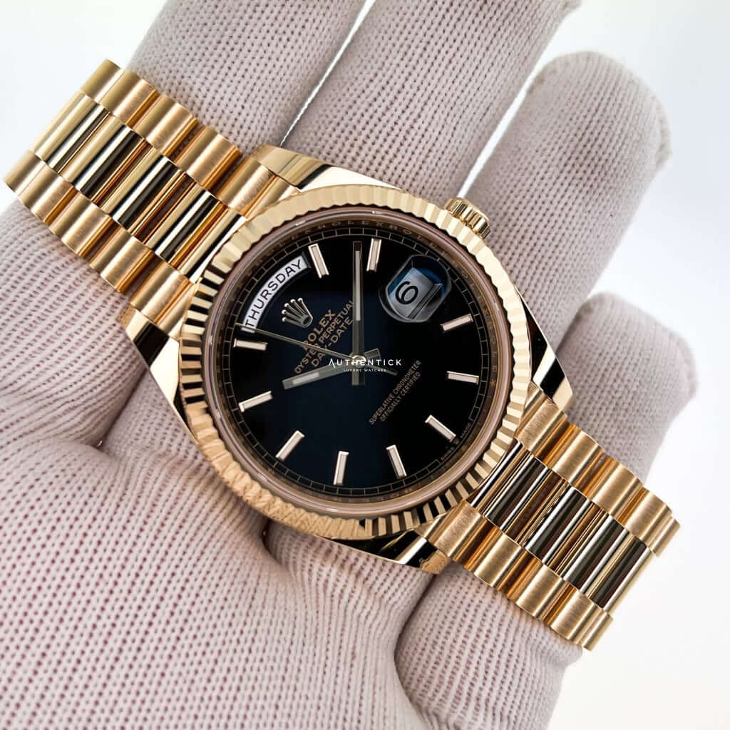 Rolex Day-Date 40 Yellow Gold Black Motif Dial 228238