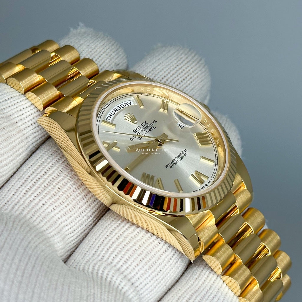 Rolex Day-Date 40 Yellow Gold Silver Roman Dial 228238