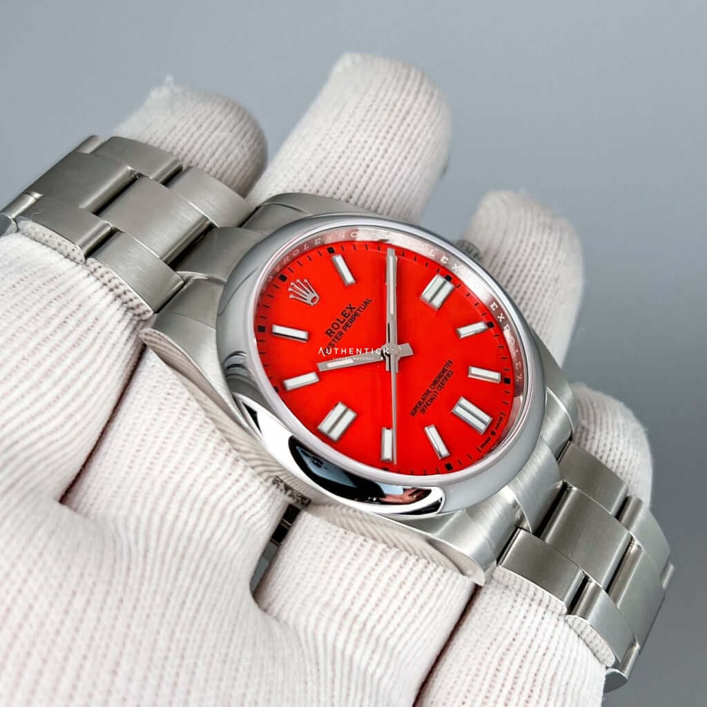 ROLEX OYSTER PERPETUAL 41 STAINLESS STEEL CORAL RED DIAL 124300