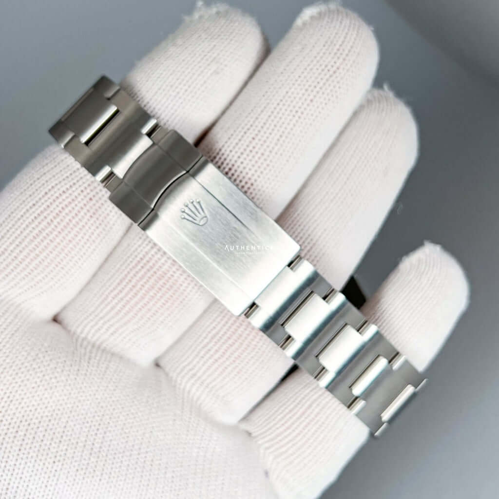 ROLEX OYSTER PERPETUAL 41 STAINLESS STEEL CORAL RED DIAL 124300