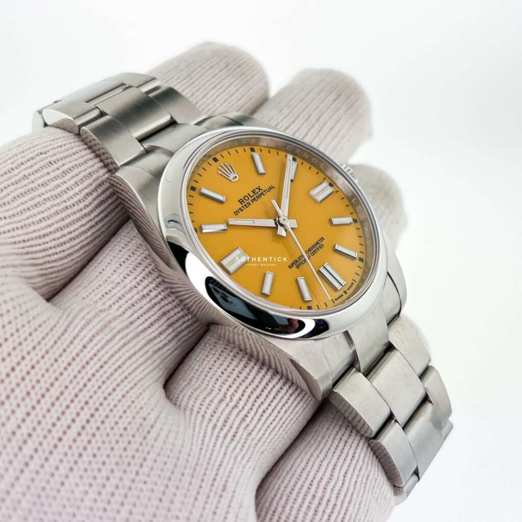 ROLEX OYSTER PERPETUAL 41 STAINLESS STEEL YELLOW DIAL 124300