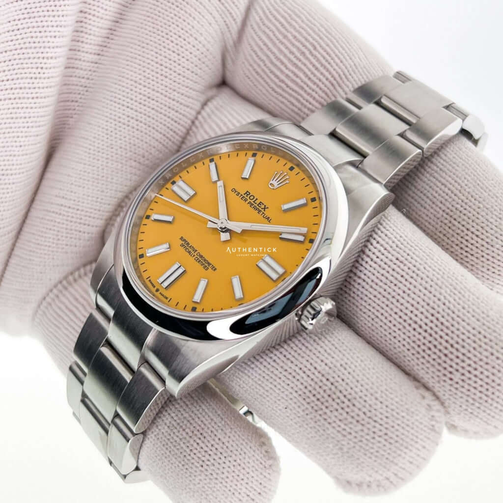 ROLEX OYSTER PERPETUAL 41 STAINLESS STEEL YELLOW DIAL 124300